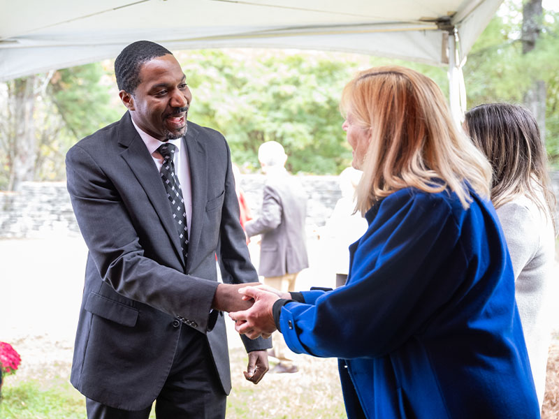 Photo of Two people shaking hands