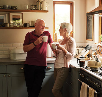 Older couple in kitchen. Link to Gifts by Will.